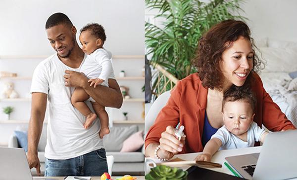 2 young parents holding a baby